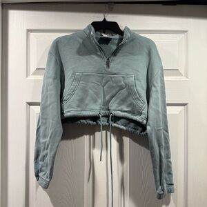 White Fox Boutique Light Blue Cropped sweatshirt. size Small/medium